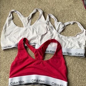 Three Calvin Klein lounge bras